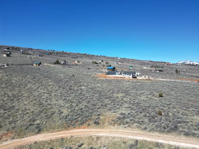 View of yard with view of desert landscape and a mountain view