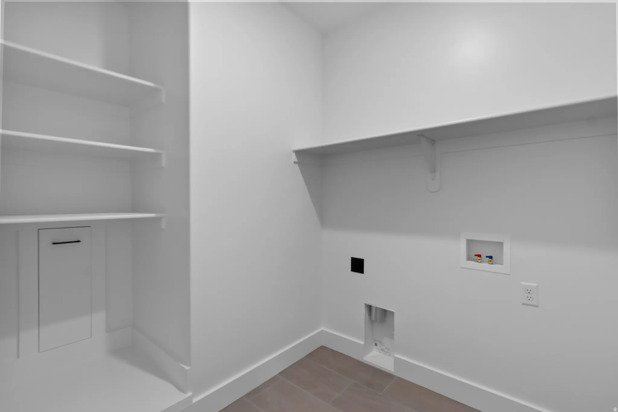 Laundry room featuring washer hookup, wood tiled floors, and hookup for an electric dryer