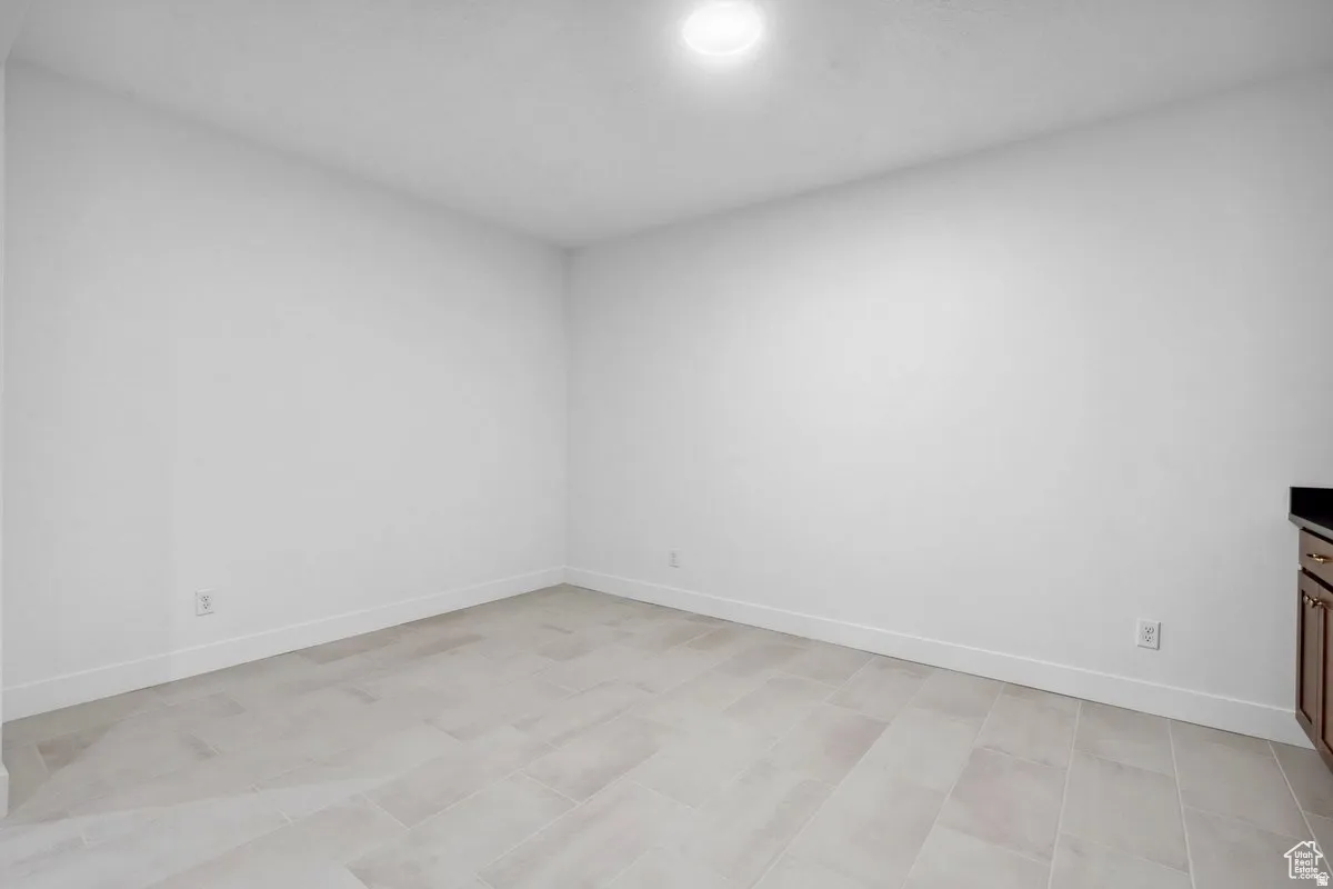 Empty room with baseboards