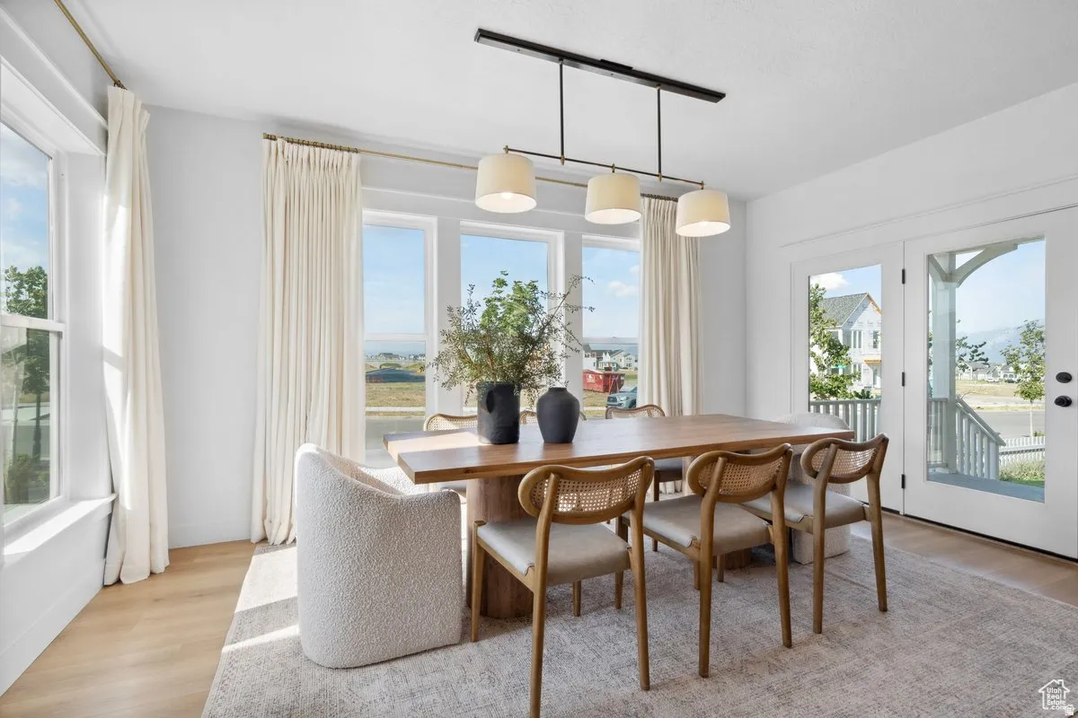 Dining space featuring light wood-style floors