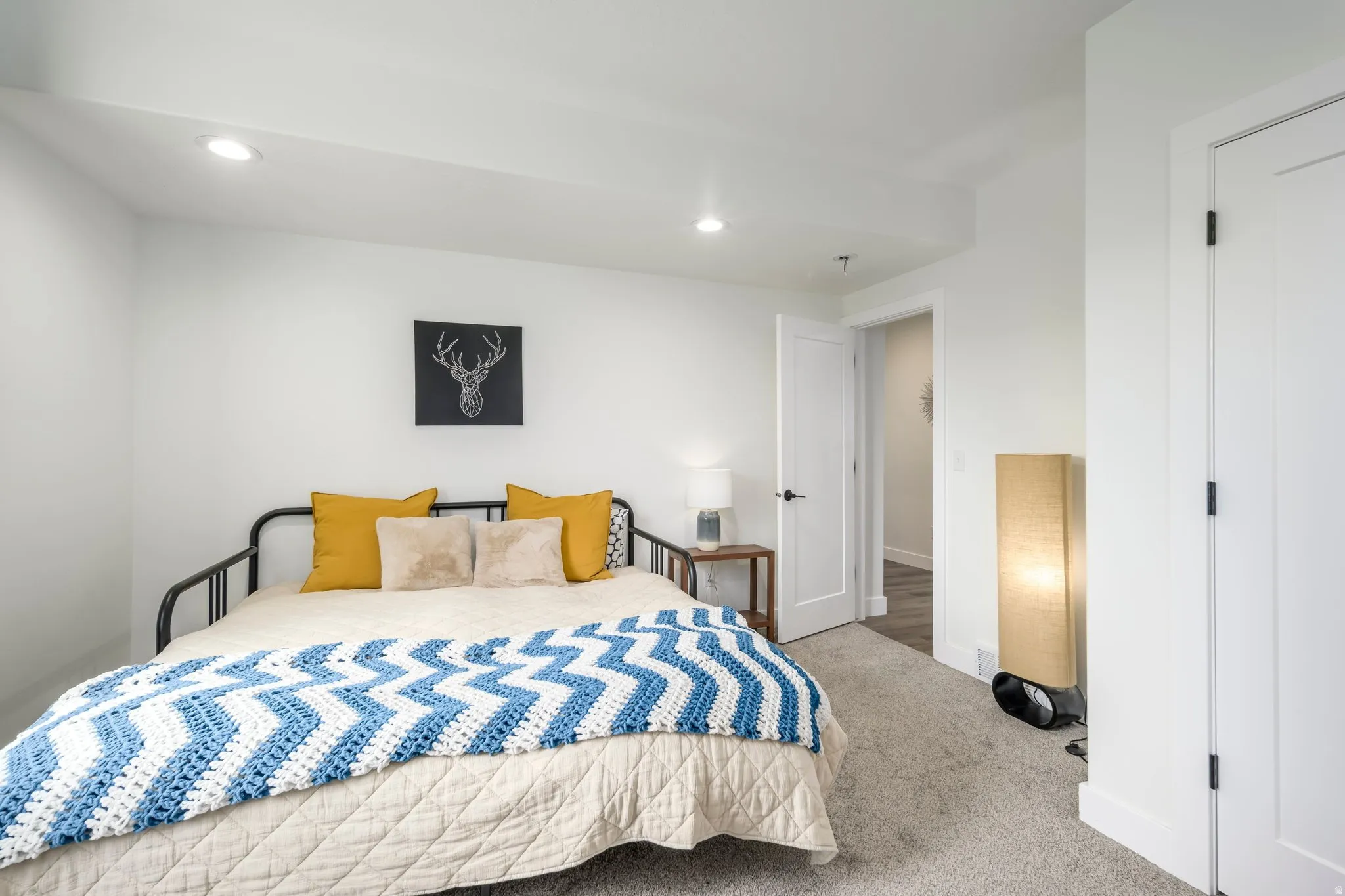 Bedroom with carpet and recessed lighting
