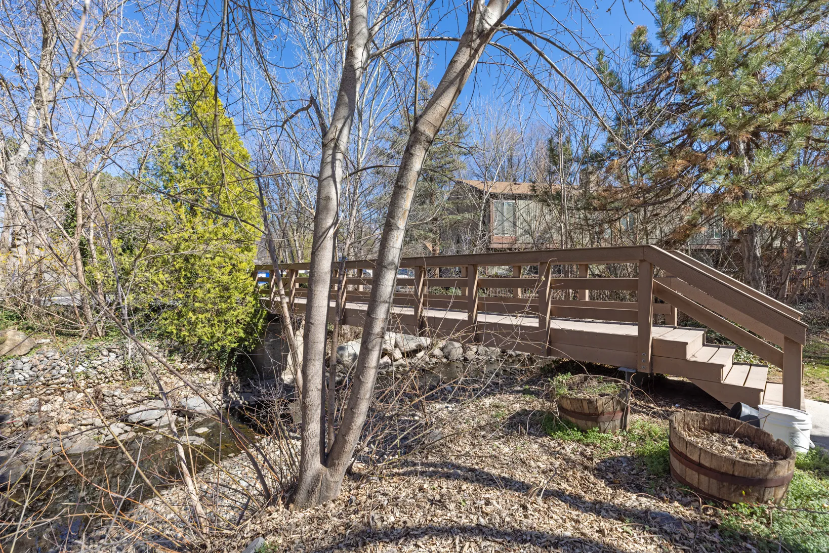 View of yard with a wooden deck