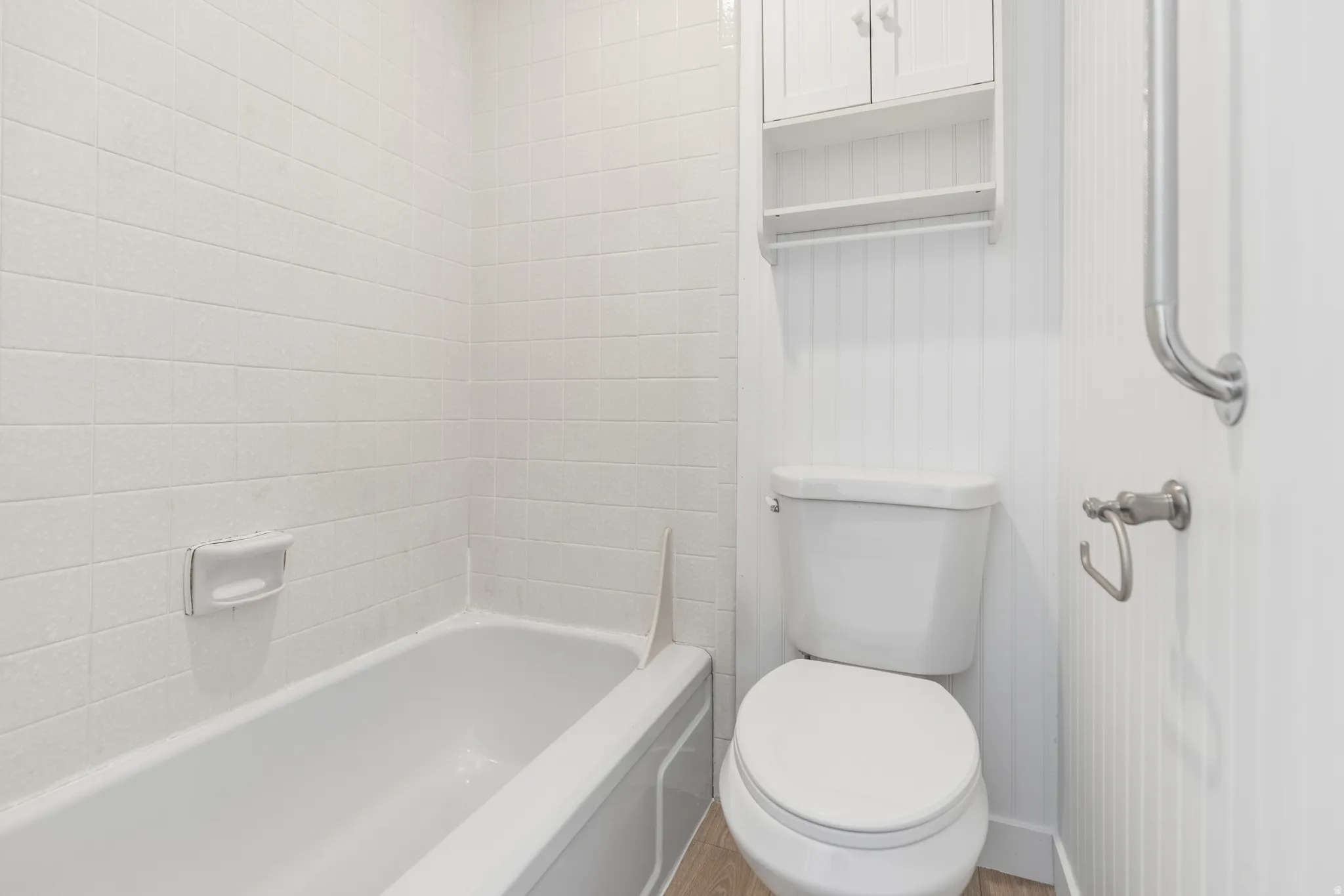 Full bath with toilet and  shower combination