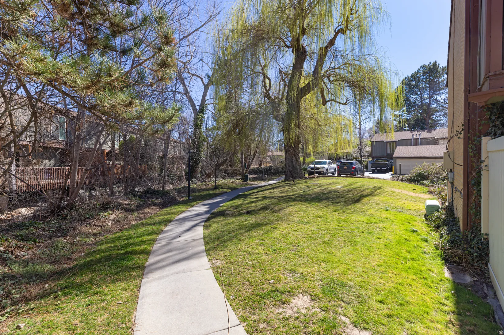 View of grassy yard featuring a residential view