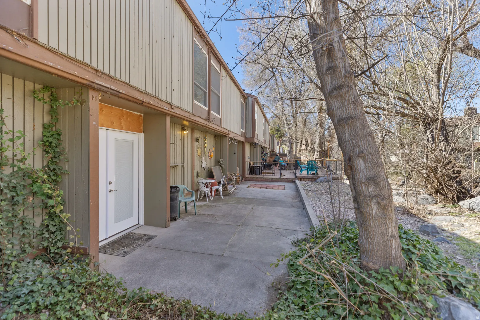 View of property exterior featuring a patio