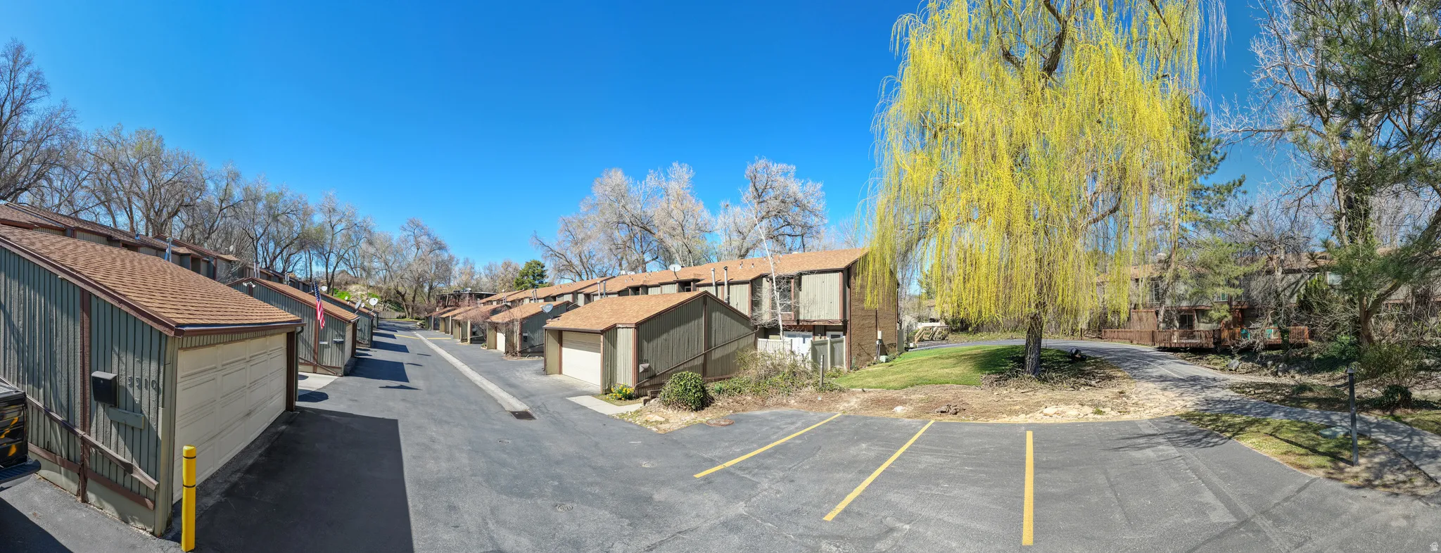 View of asphalt road with a residential view