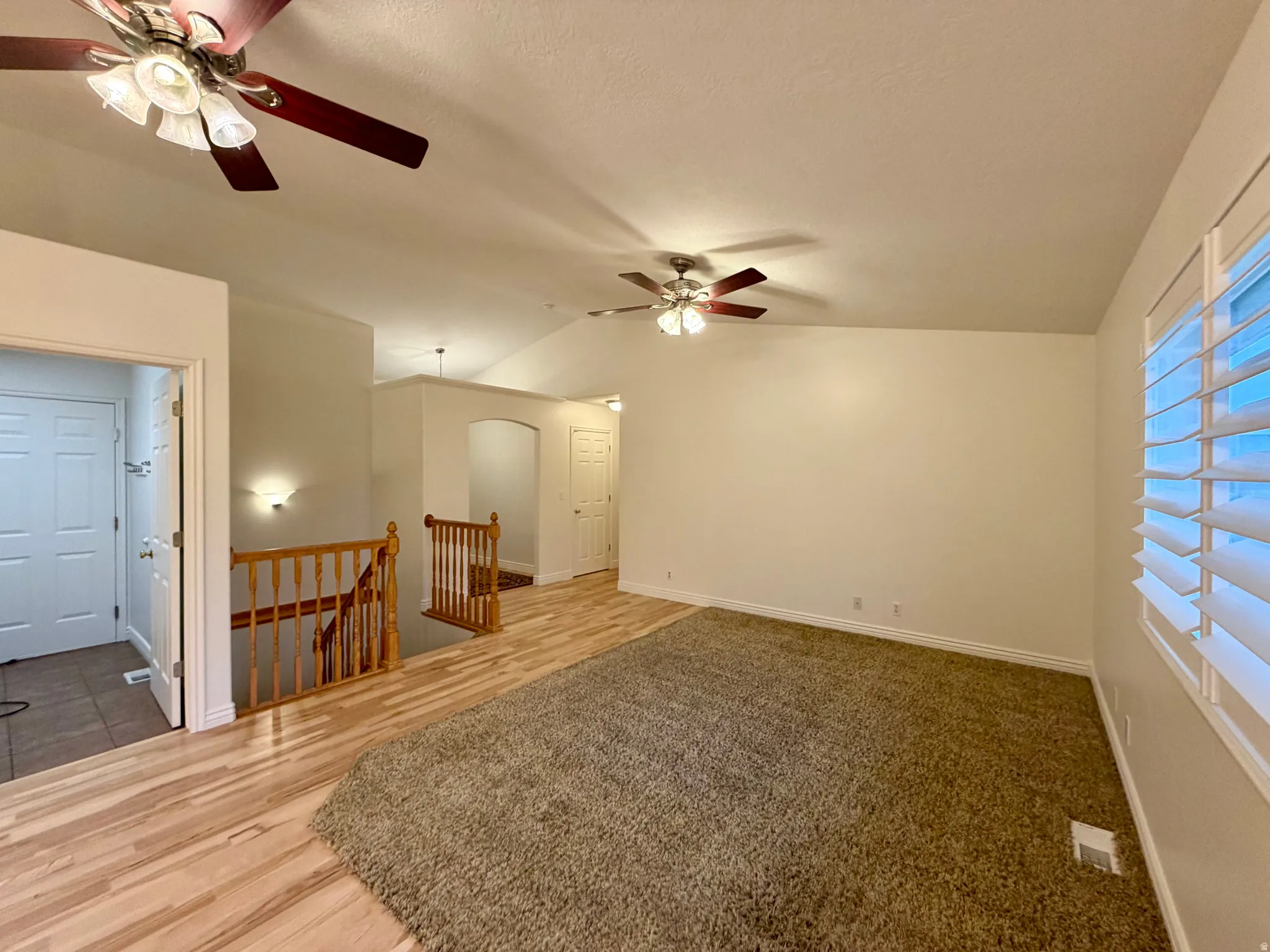 Bright living room with large window and centrally located