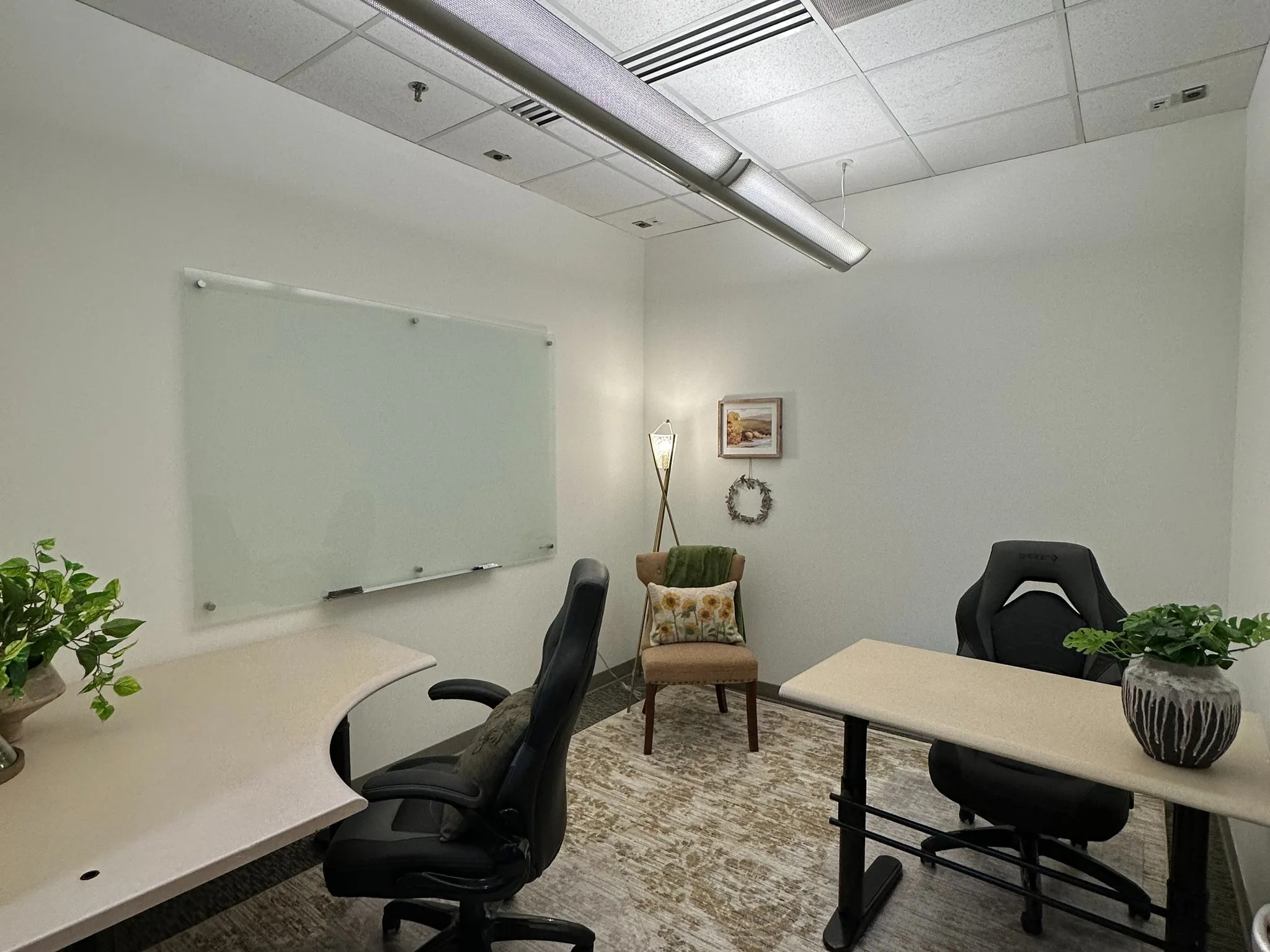 Office featuring a drop ceiling