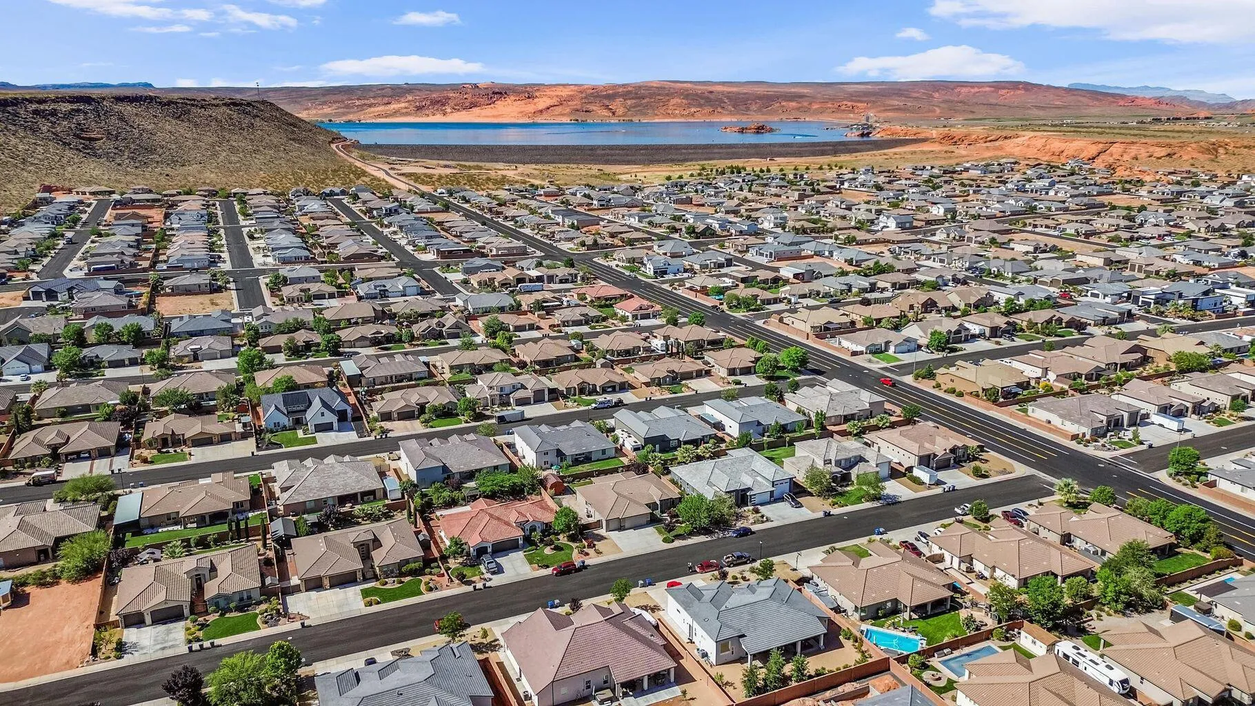 Aerial view of residential area with a water and mountain view