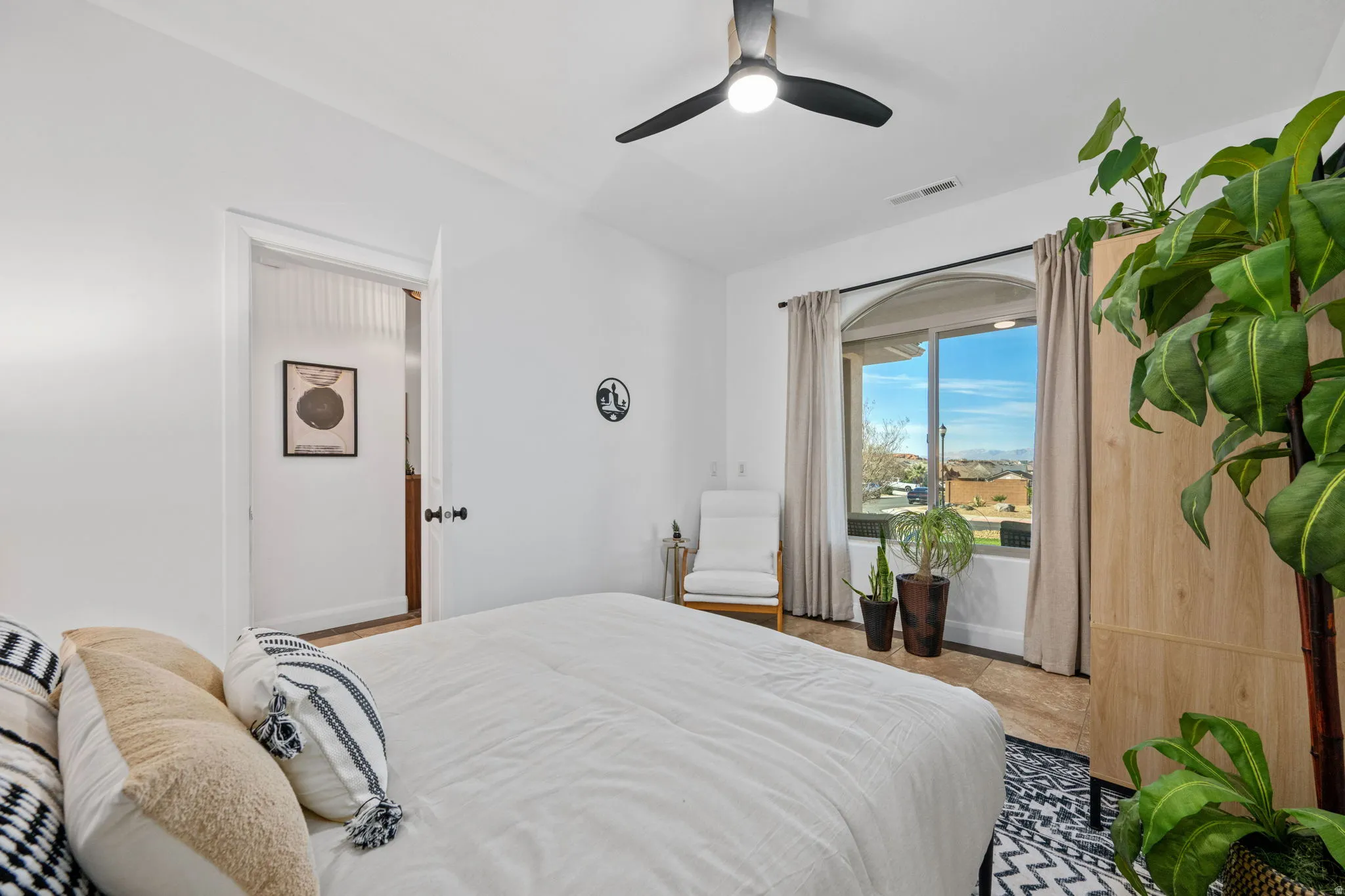 Bedroom featuring a ceiling fan