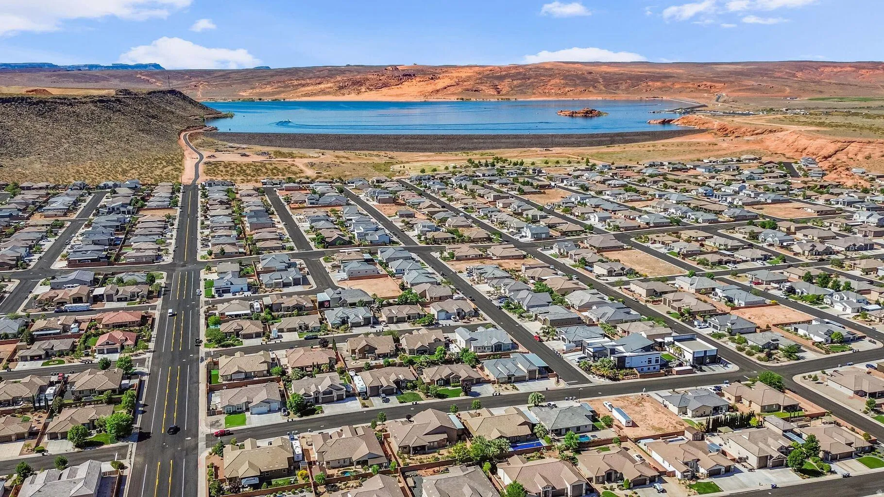 Aerial view of residential area with a water and mountain view