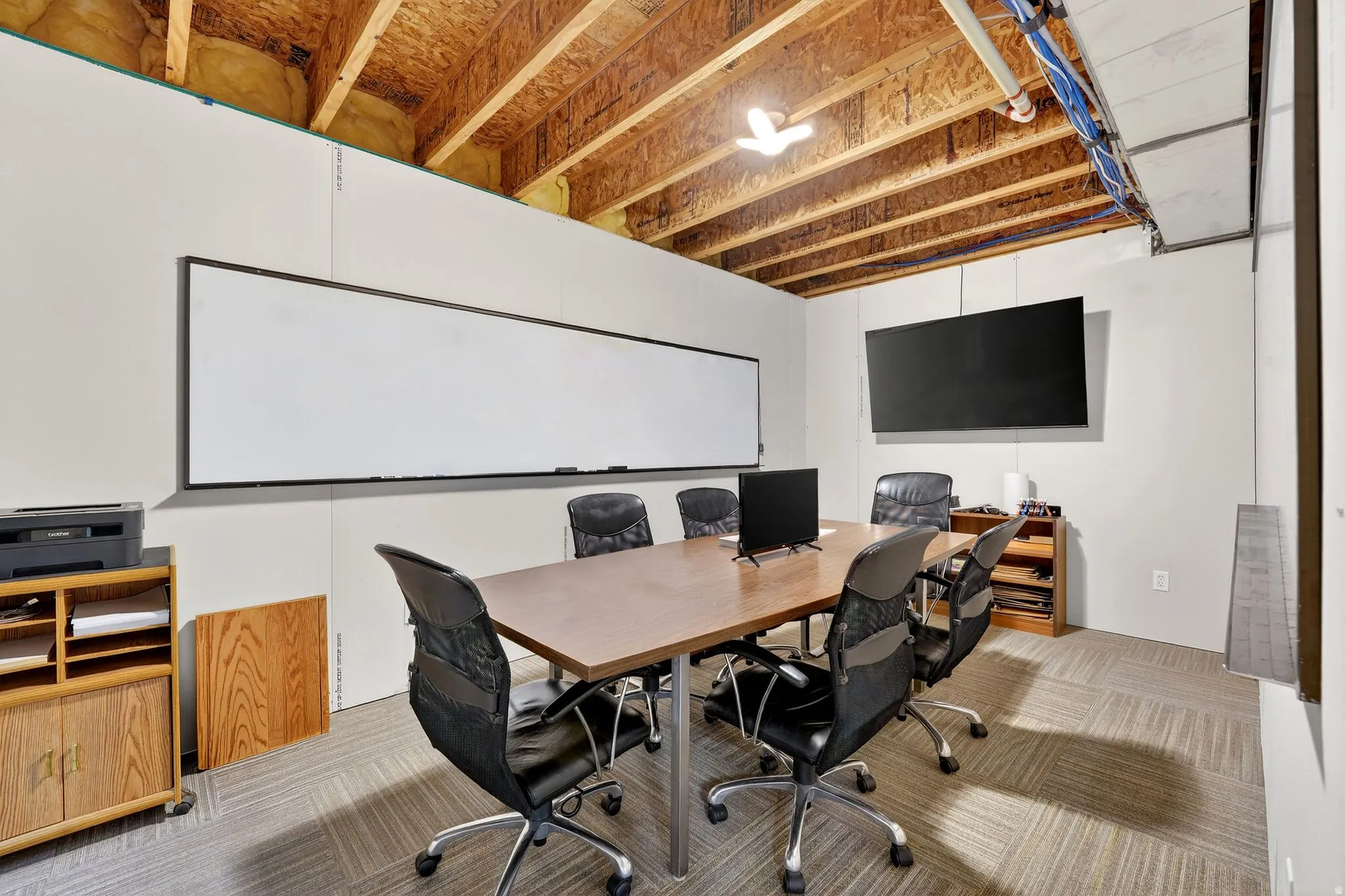 View of carpeted home office