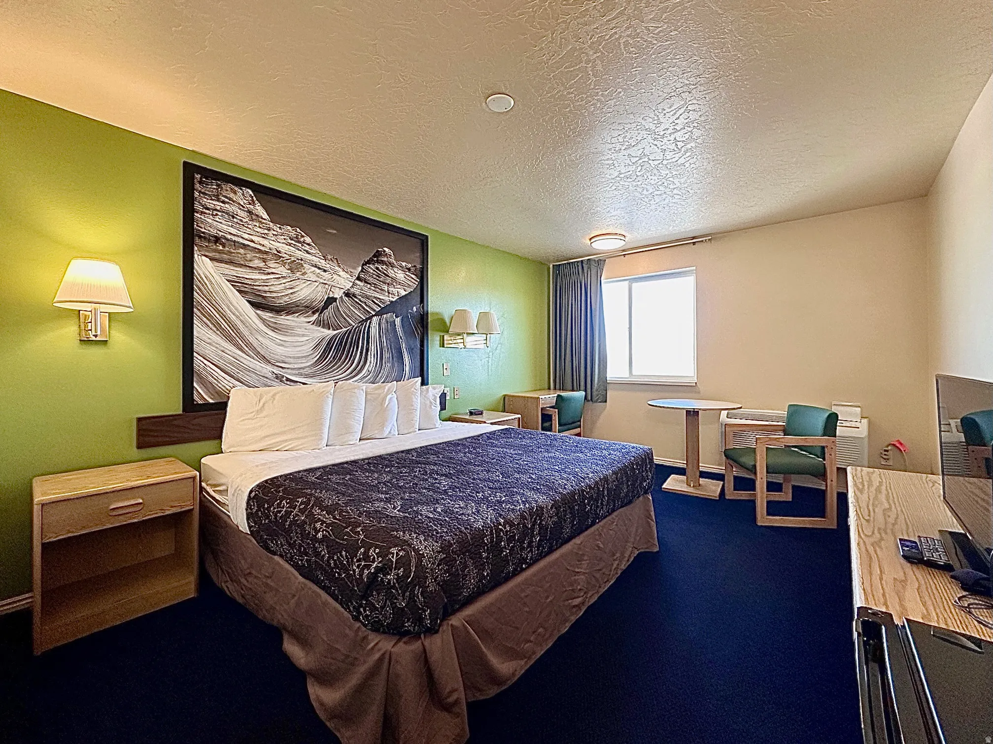 Bedroom with a textured ceiling