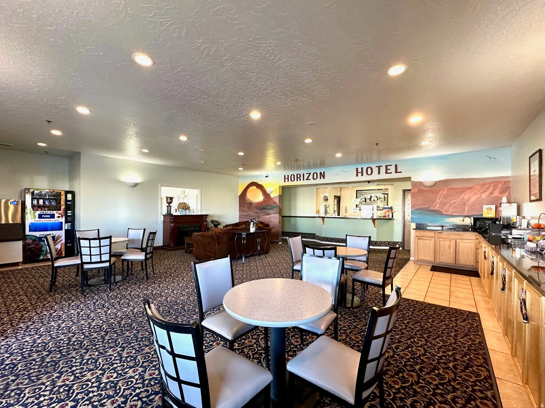 Dining space with recessed lighting and a textured ceiling