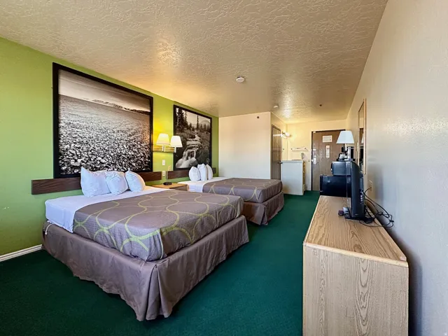 Bedroom with carpet flooring and a textured ceiling