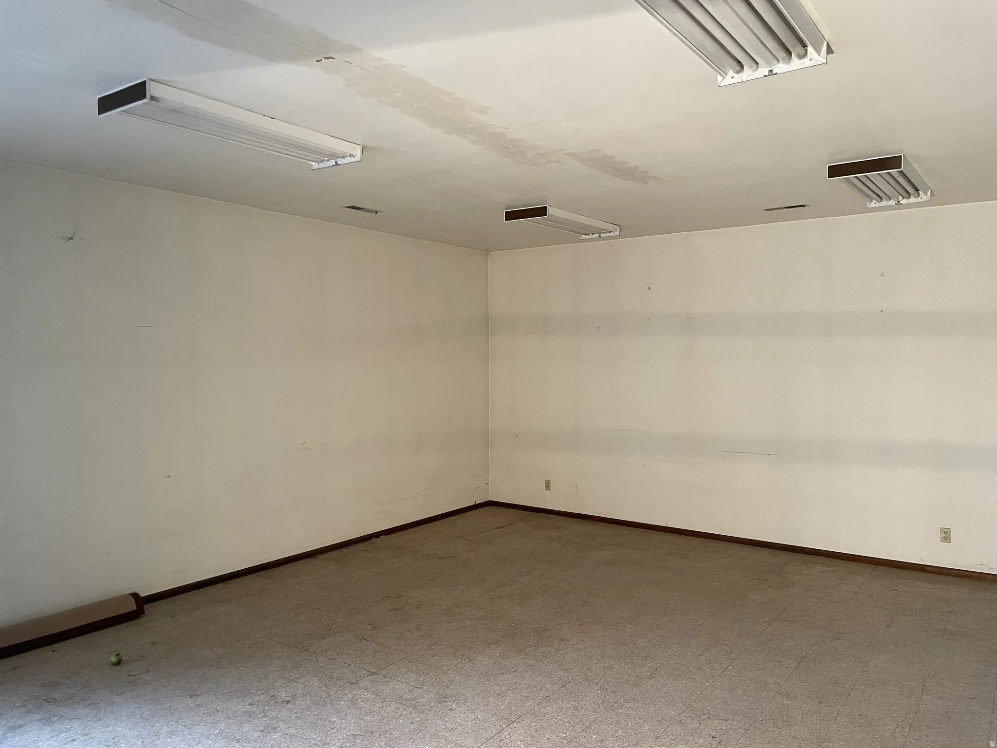 Spare room with tile patterned floors