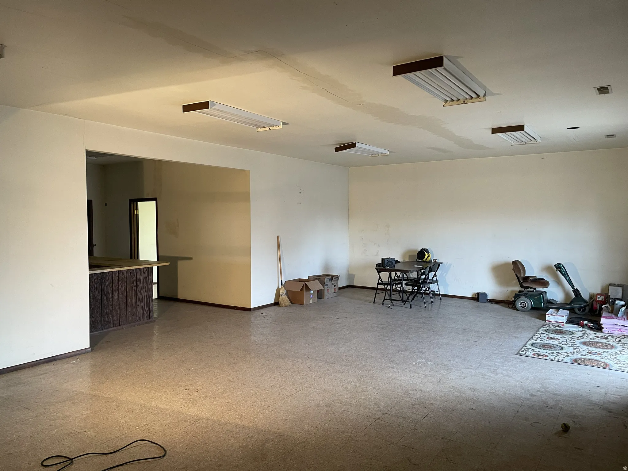 Miscellaneous room with light floors and cooling unit
