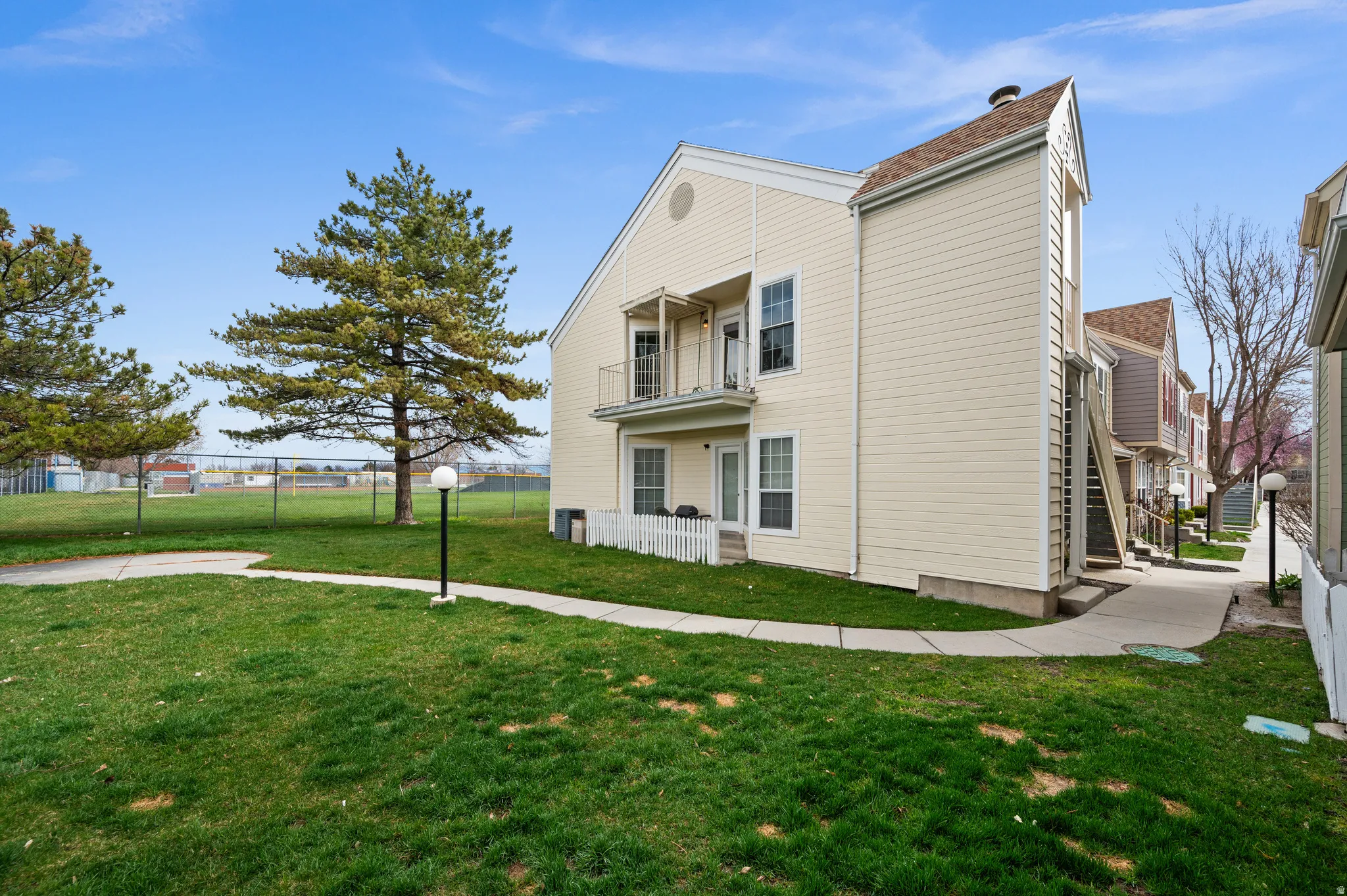 View of home's exterior with a balcony