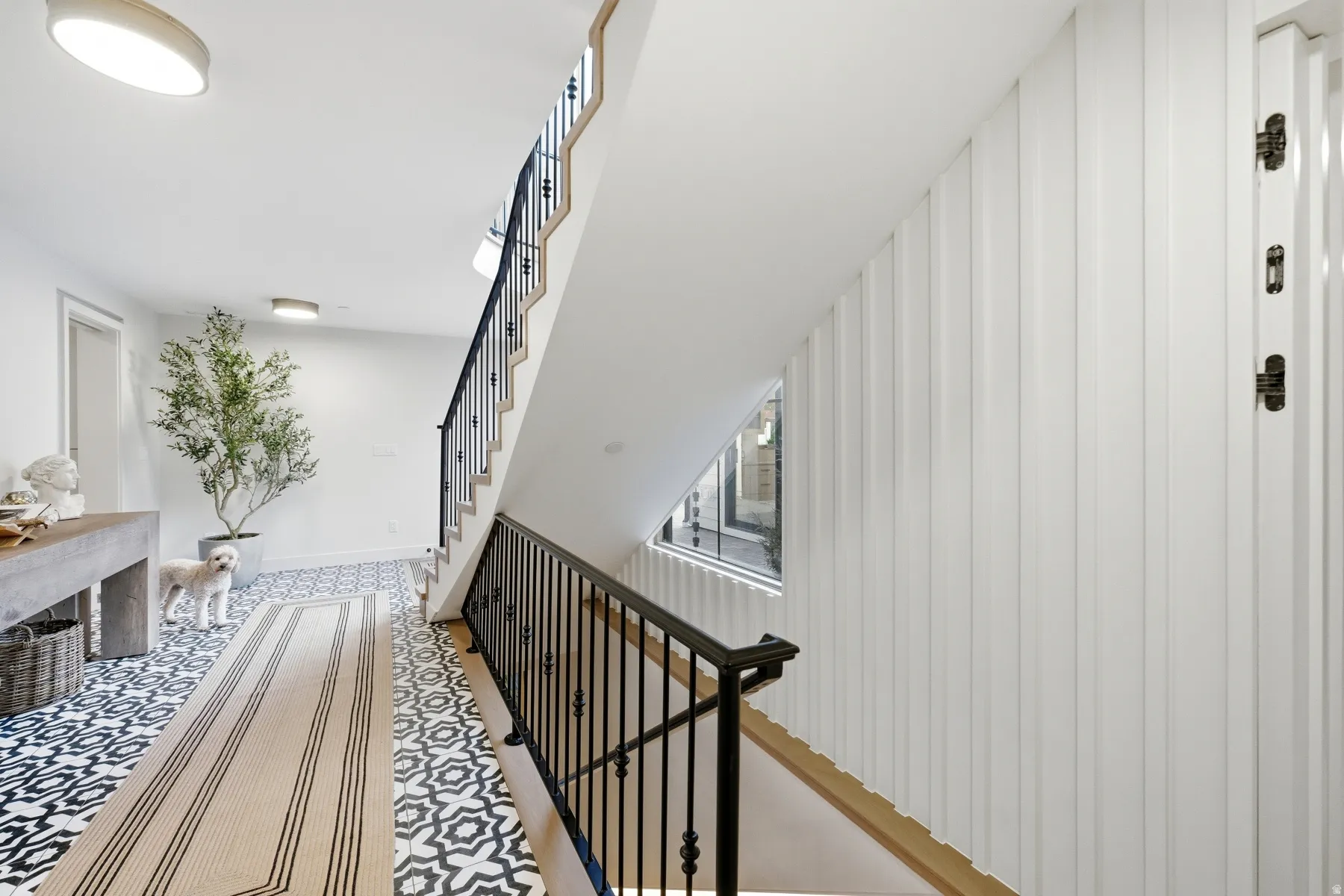 Stairs featuring baseboards