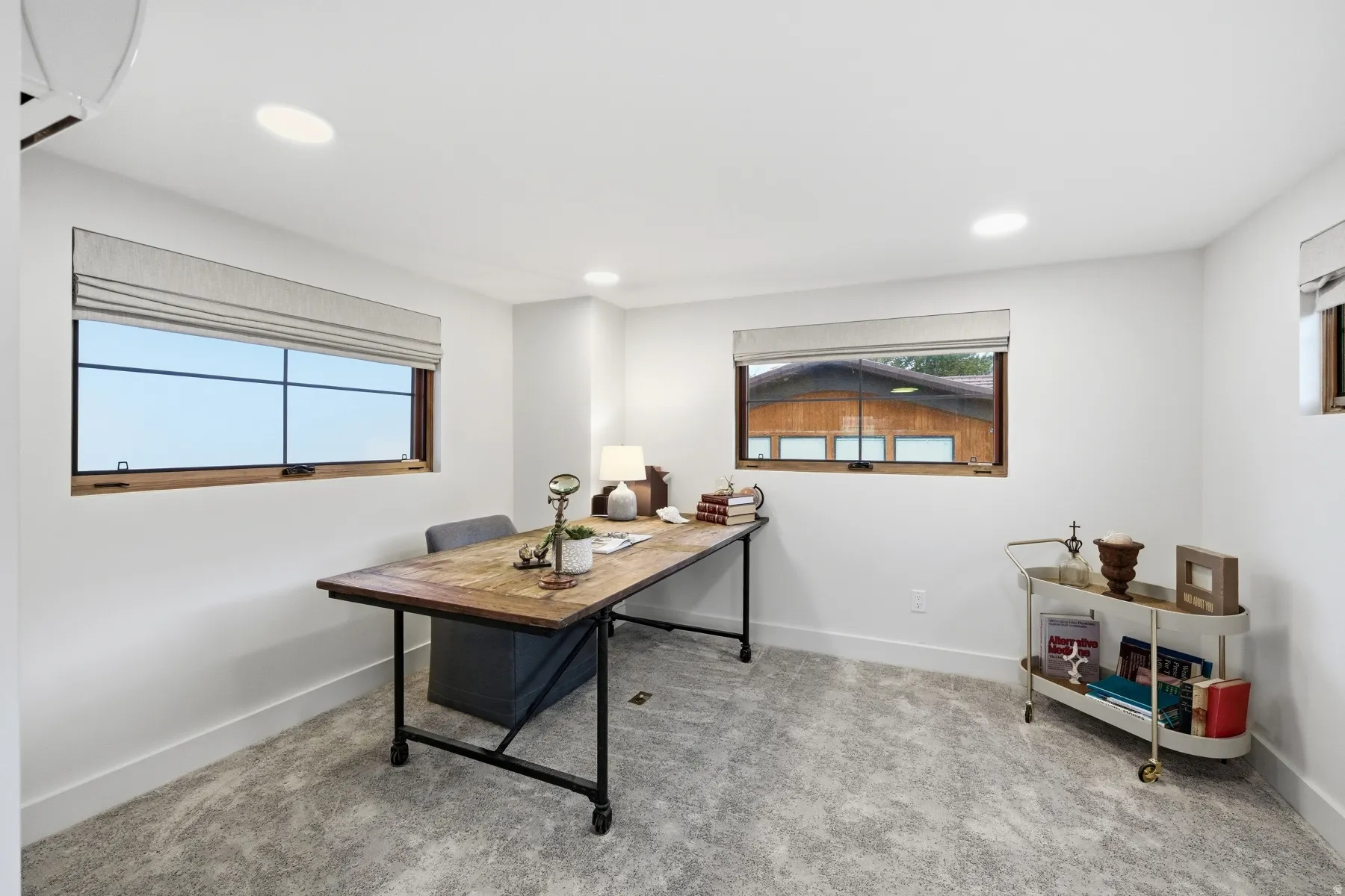 Home office featuring carpet floors and recessed lighting
