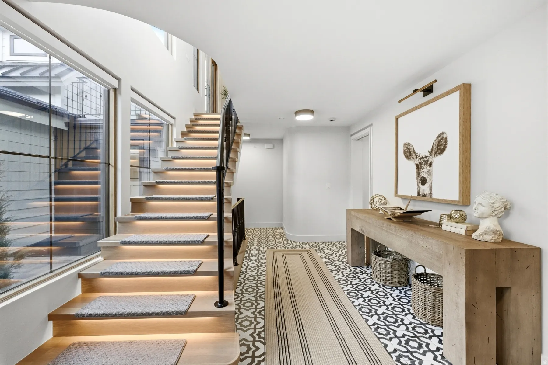 Stairway featuring baseboards