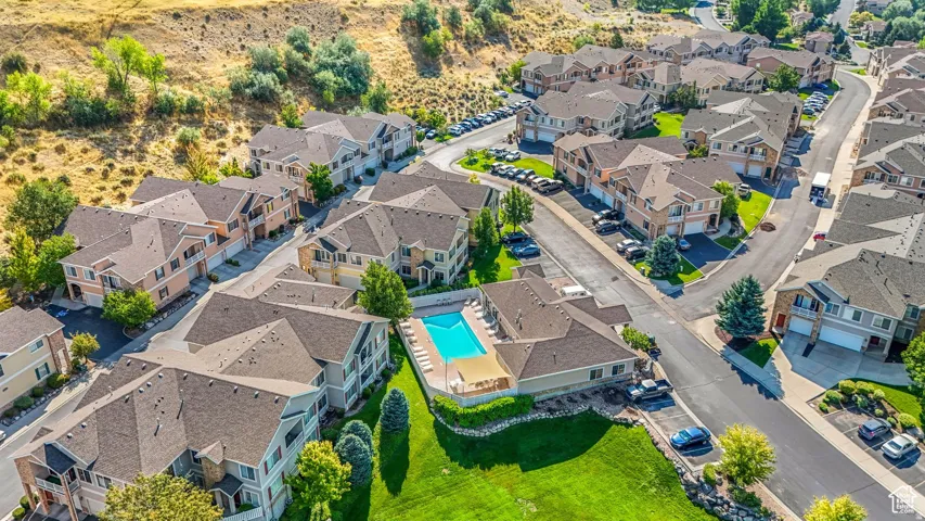 Aerial overview of property's location with a pool