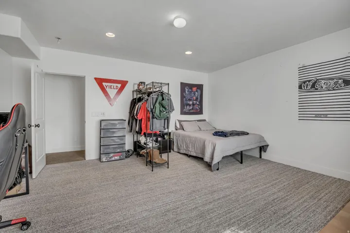 Bedroom with carpet floors and recessed lighting
