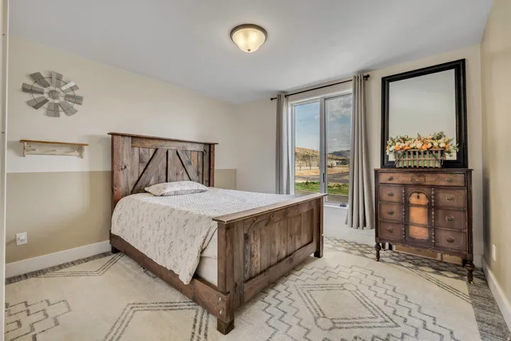 Bedroom featuring baseboards