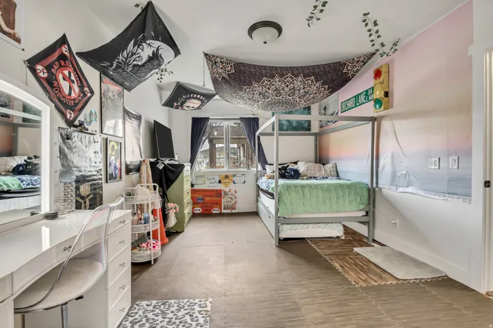 Bedroom featuring baseboards