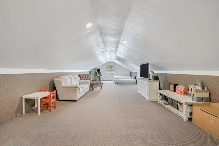 Playroom featuring light carpet