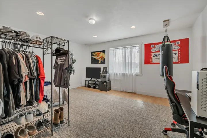 Walk in closet featuring light wood finished floors