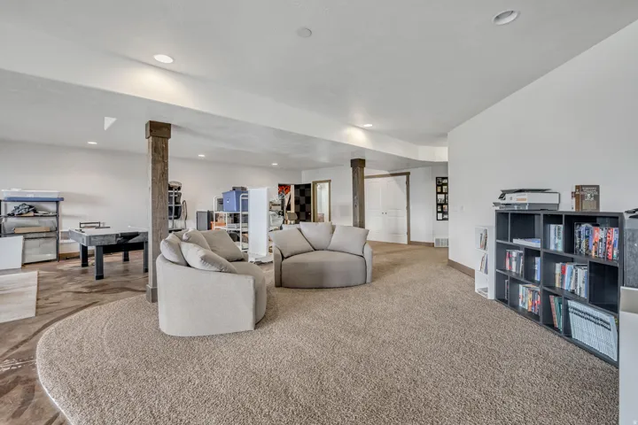 Living area featuring recessed lighting and carpet floors