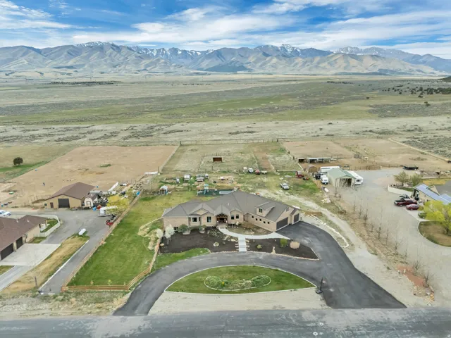 Aerial view of sparsely populated area with a mountain backdrop