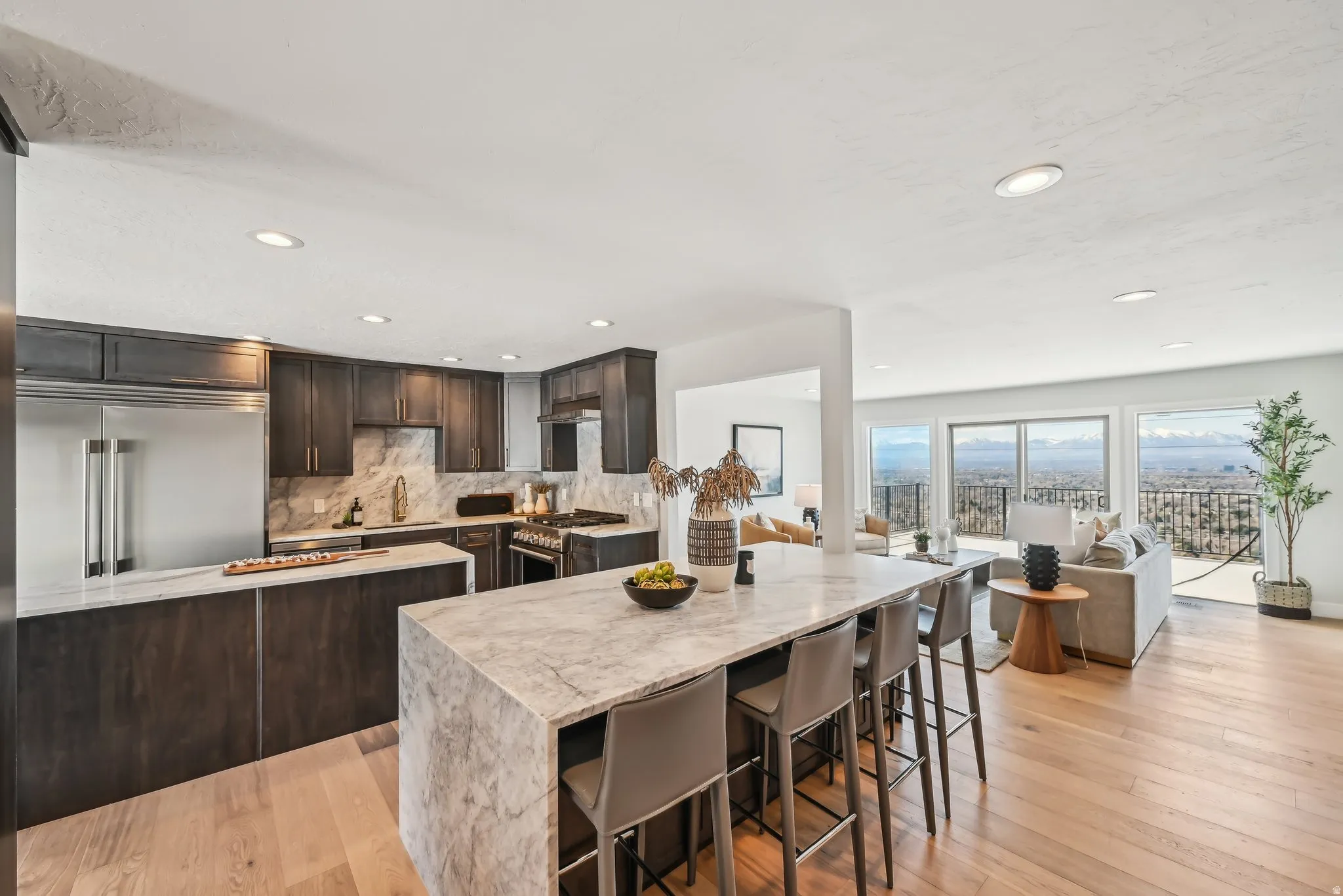 s/s appliances, high end stove, quartzite, 12' cabinets under bar, soft close drawers and cabinets