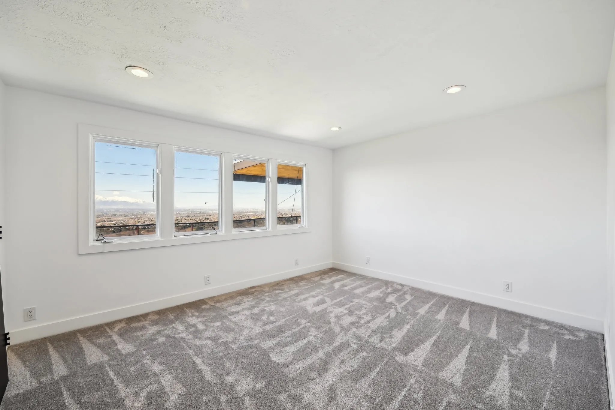 Basement bedroom, large closets, tons of natural light with west views of the city and sunset