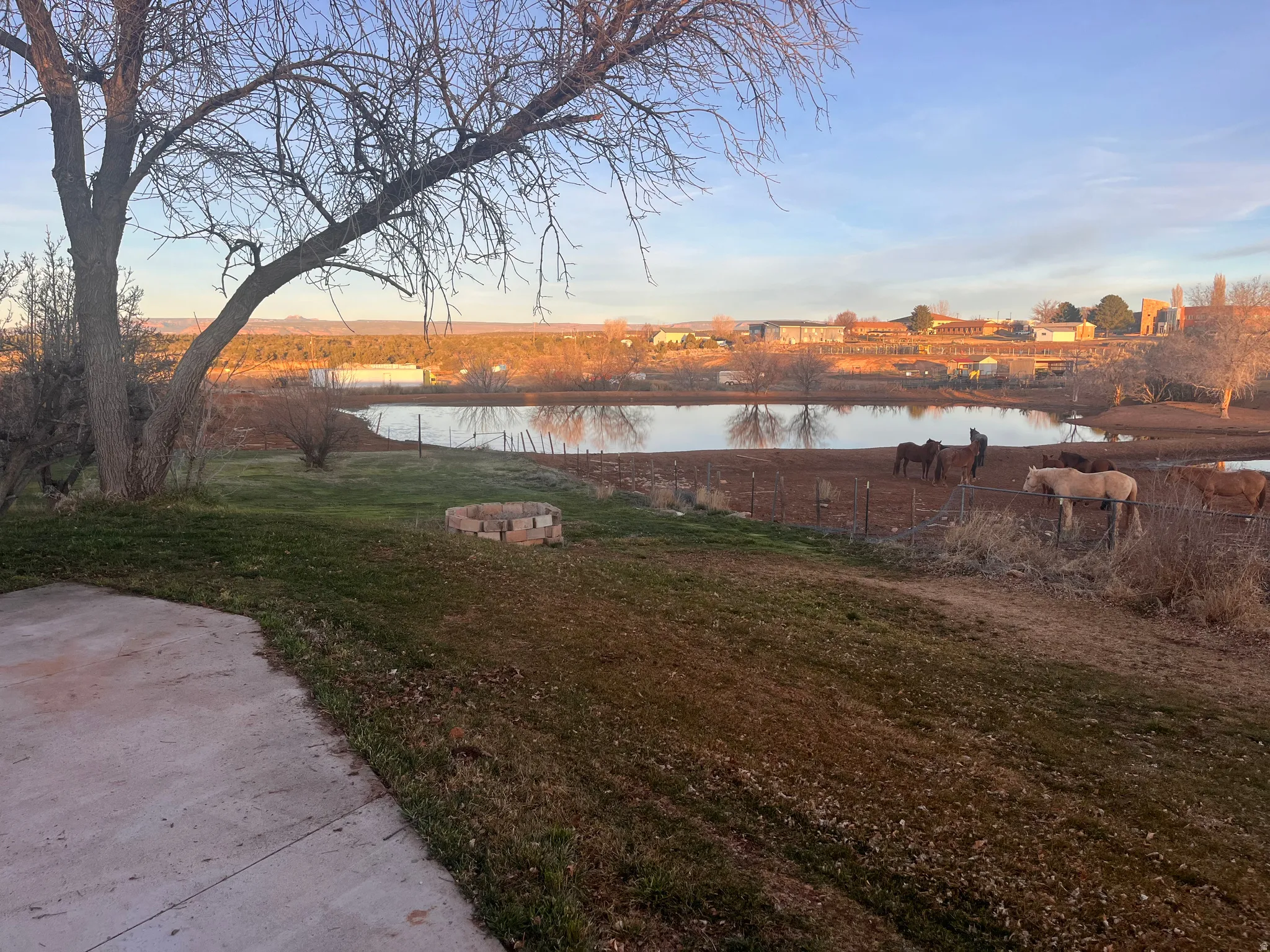 View of grassy yard featuring a water view