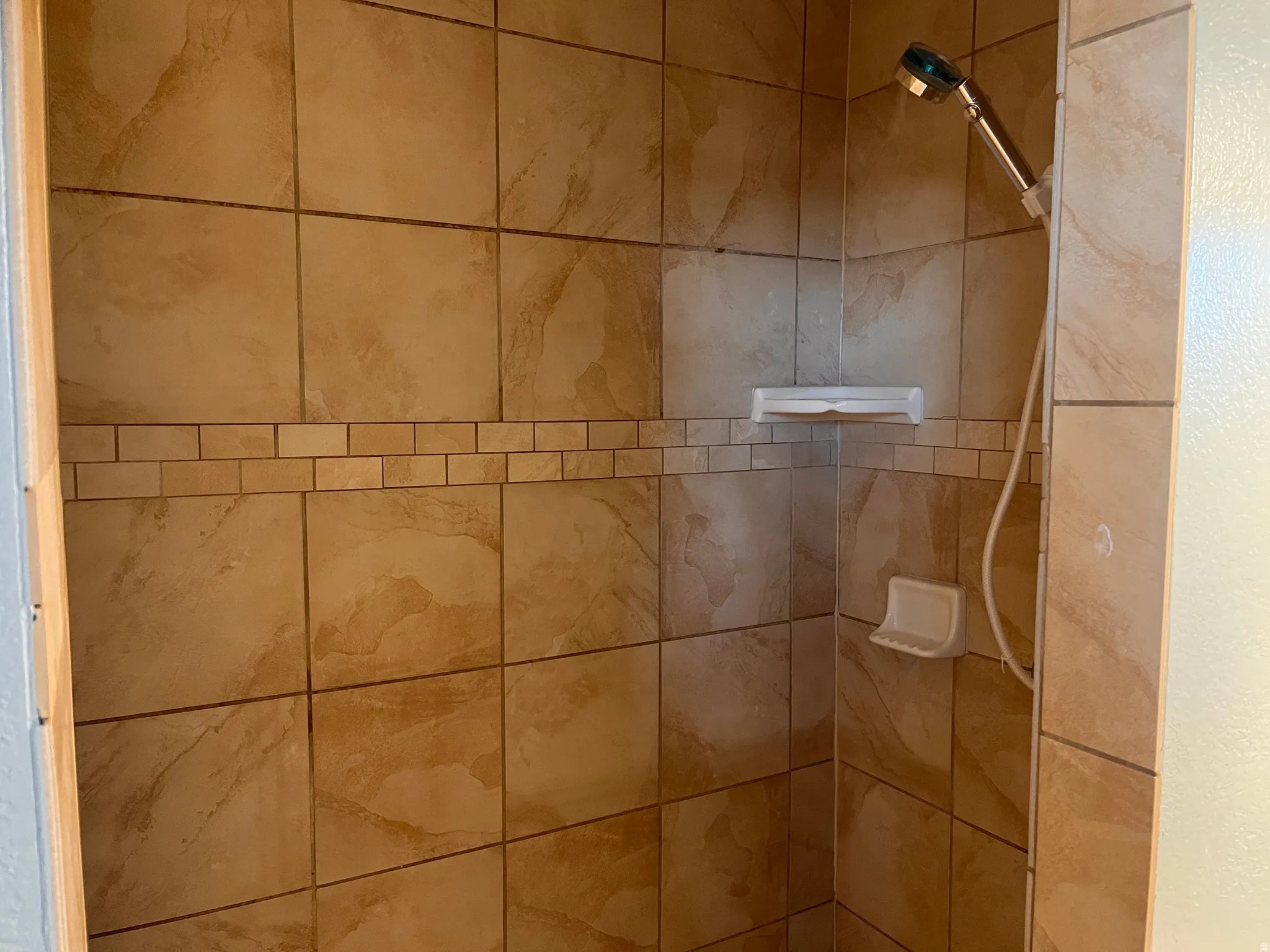Bathroom view of a stall shower