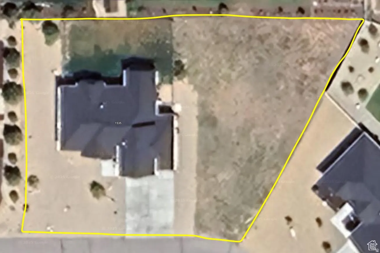 Aerial view of property's location featuring property parcel outlined