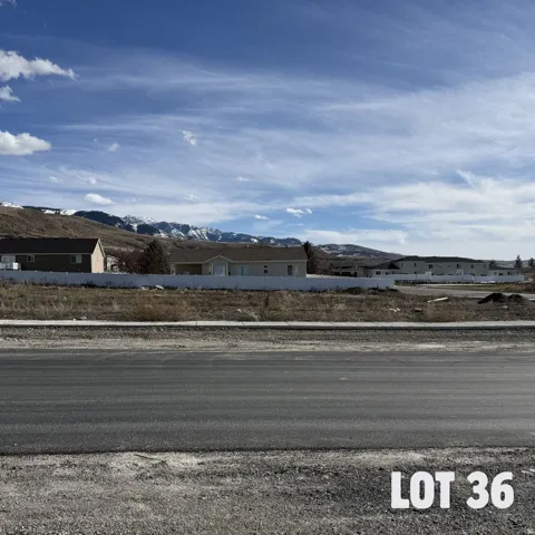 View of asphalt road featuring a mountain view