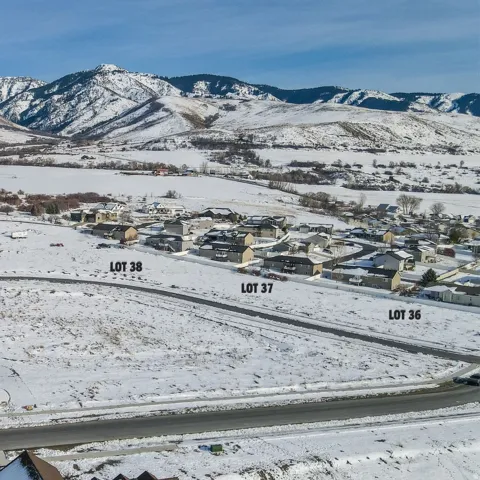 View of mountain background featuring nearby suburban area