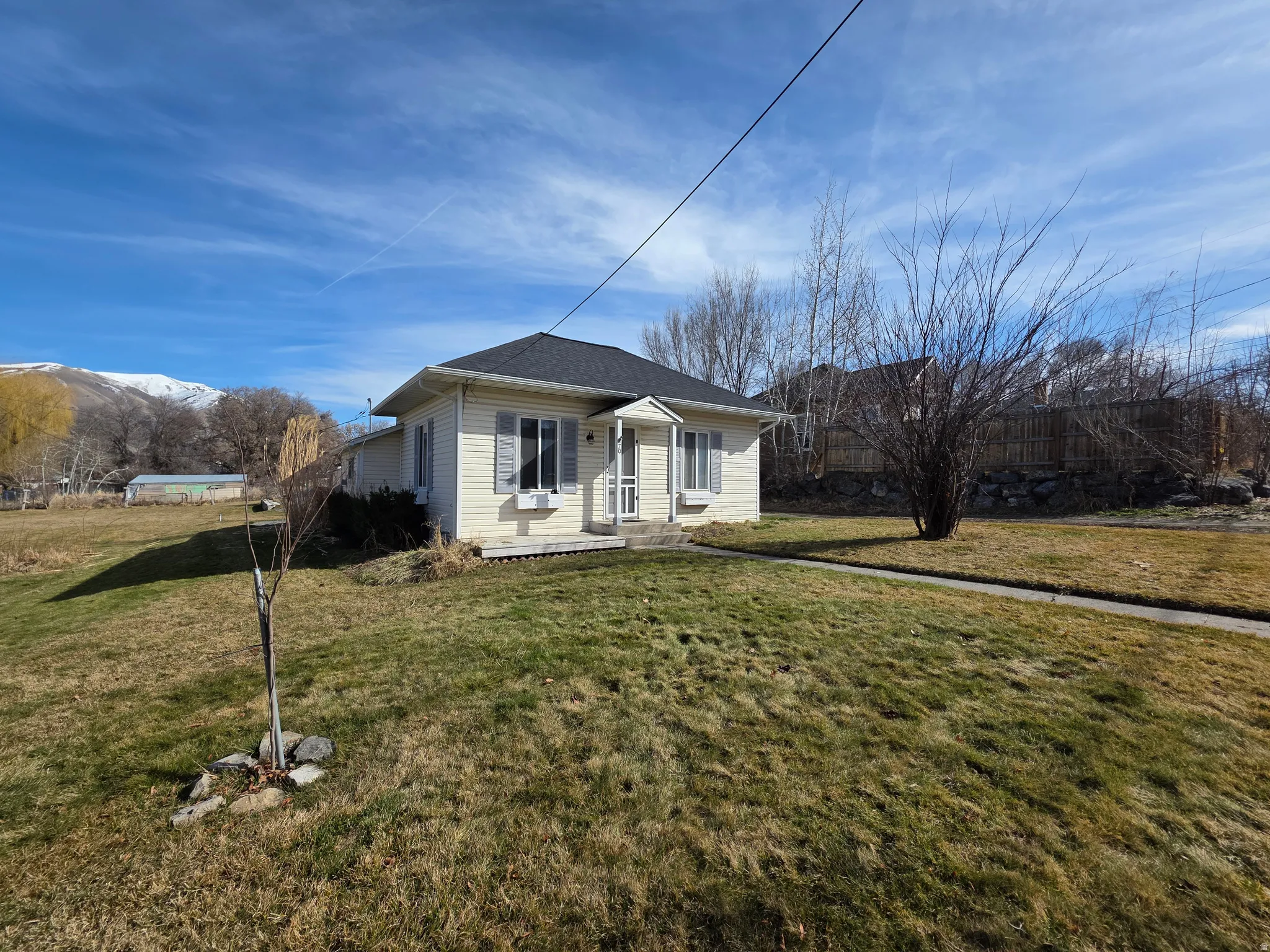 View of front of home featuring a mountain view