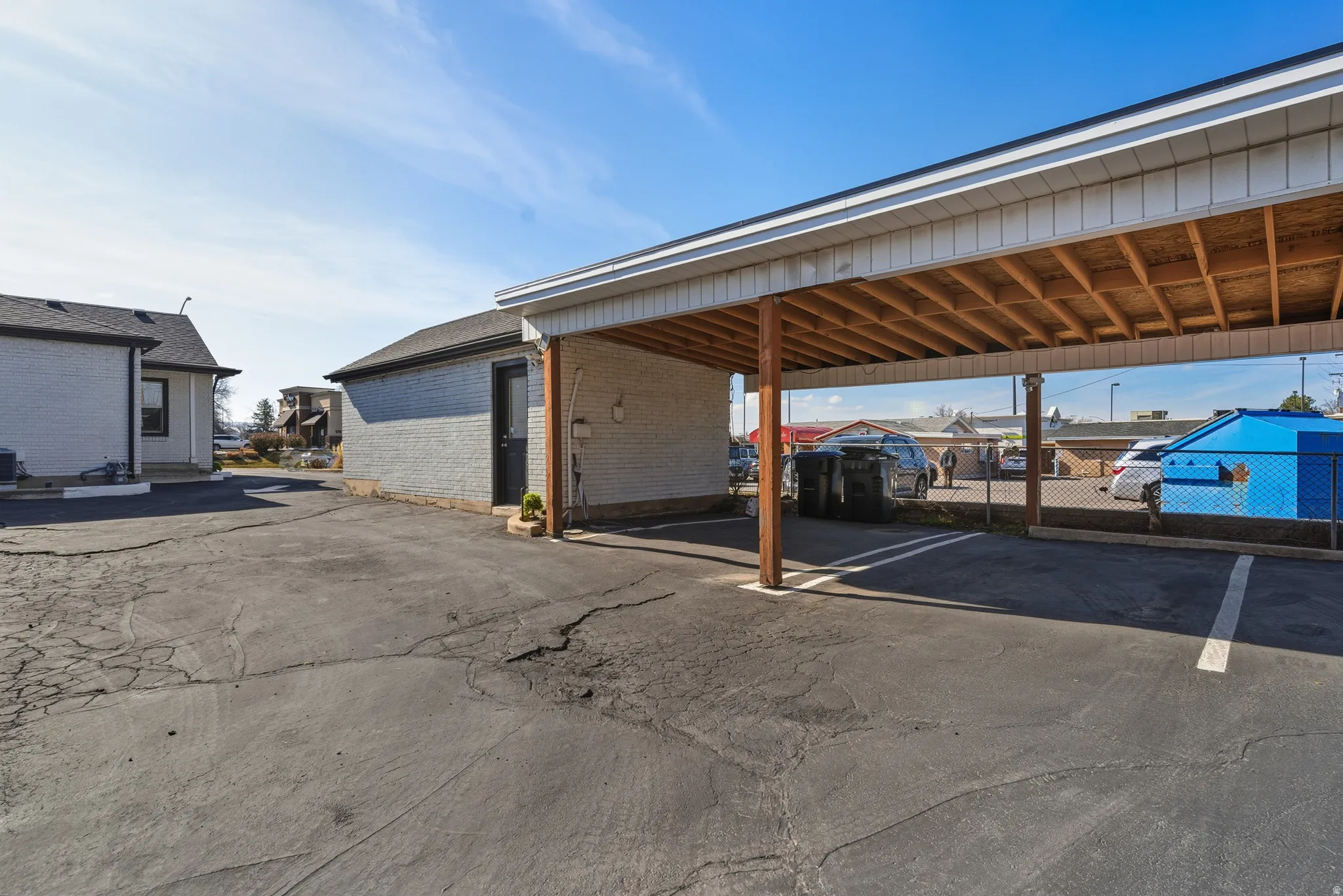 Covered parking lot with a residential view