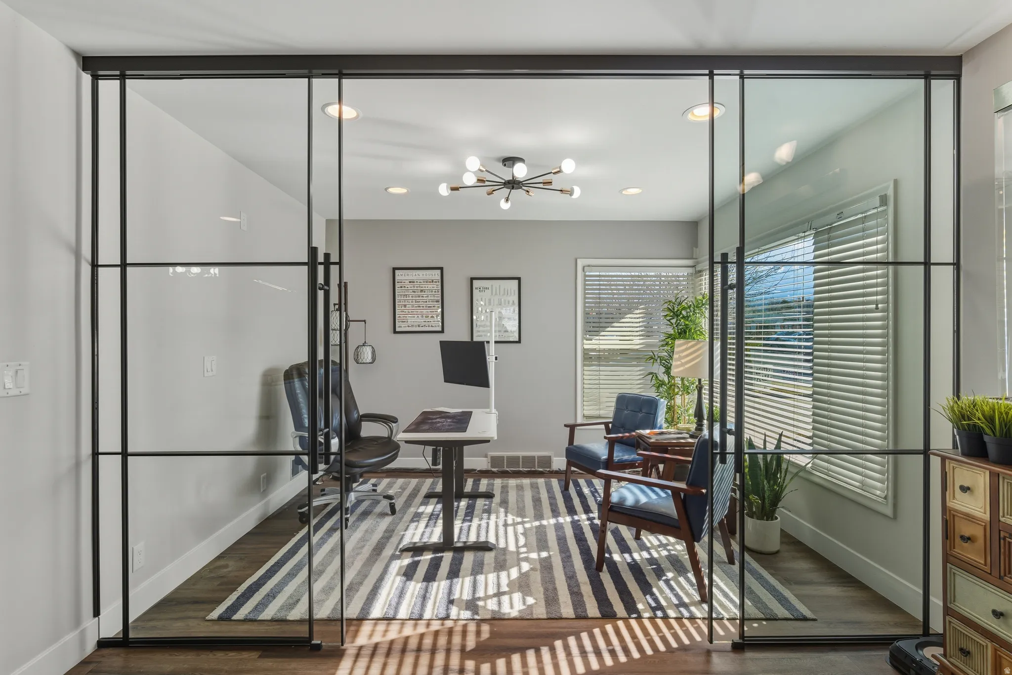 Home office featuring dark wood finished floors and recessed lighting