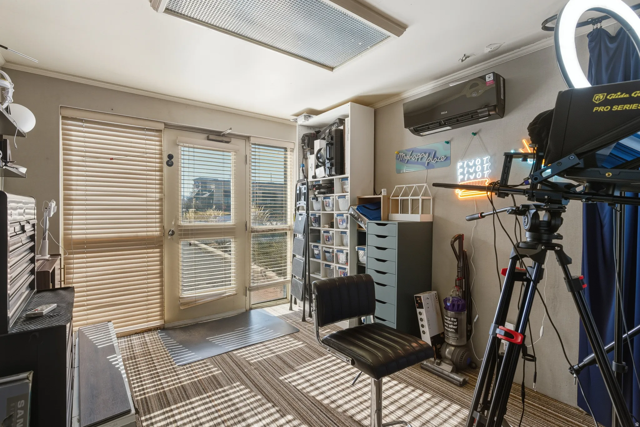 Exercise area featuring crown molding