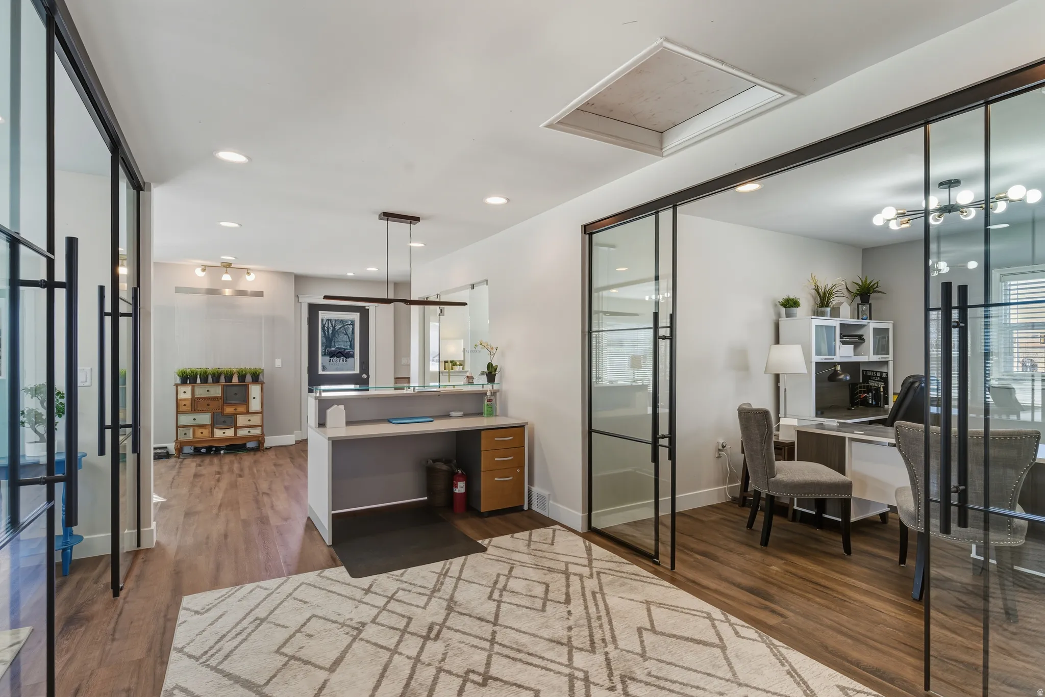 Office with recessed lighting and dark wood finished floors