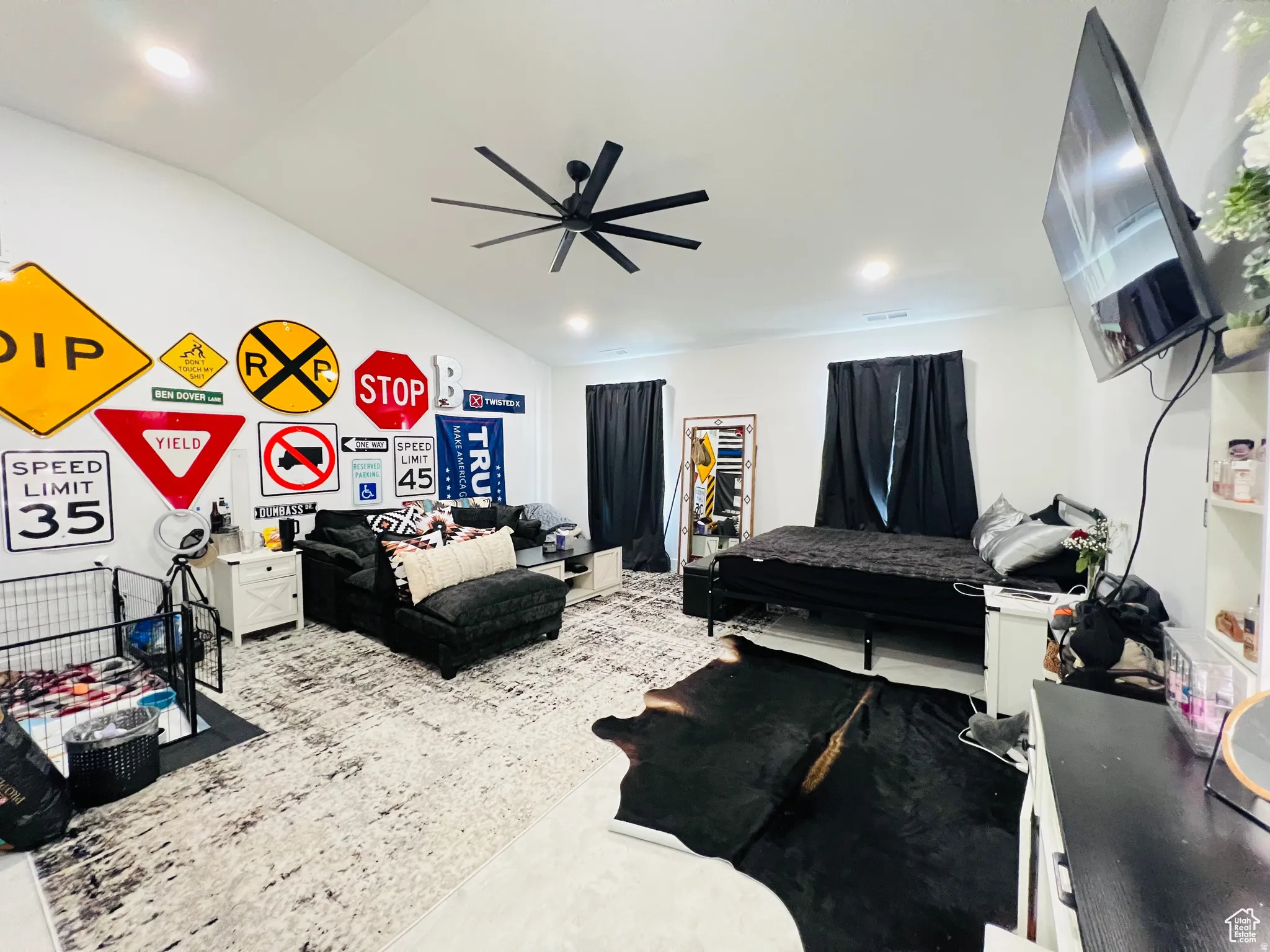 Bedroom with vaulted ceiling, ceiling fan, and recessed lighting