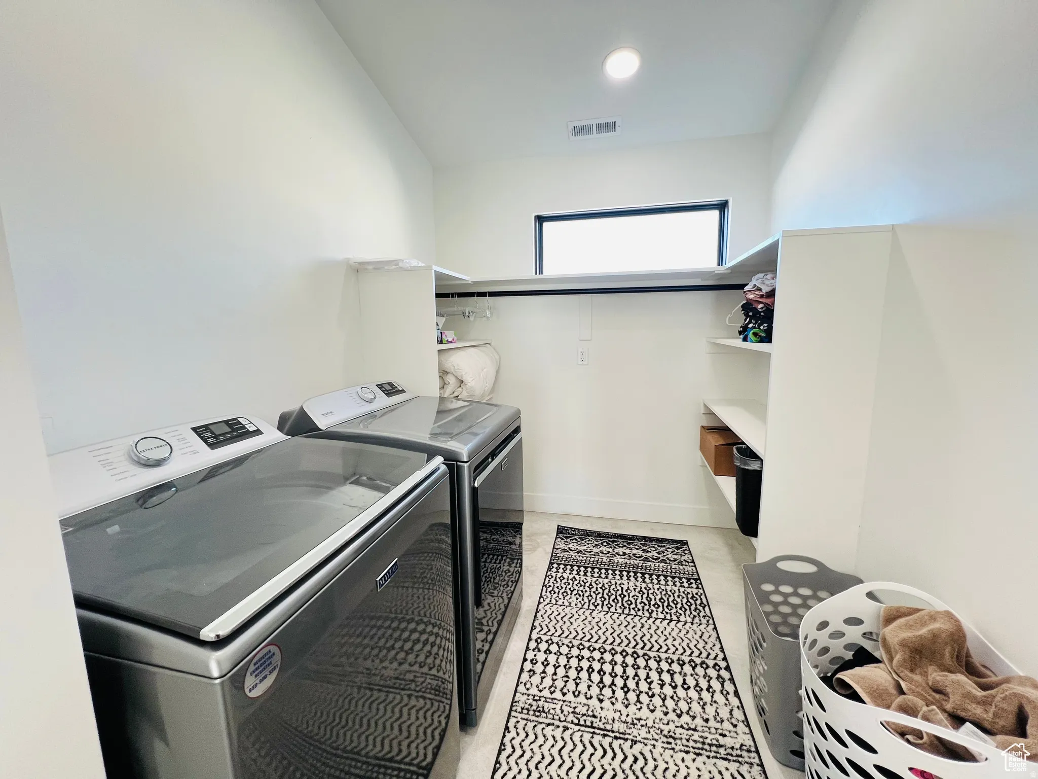 Laundry area with washing machine and dryer