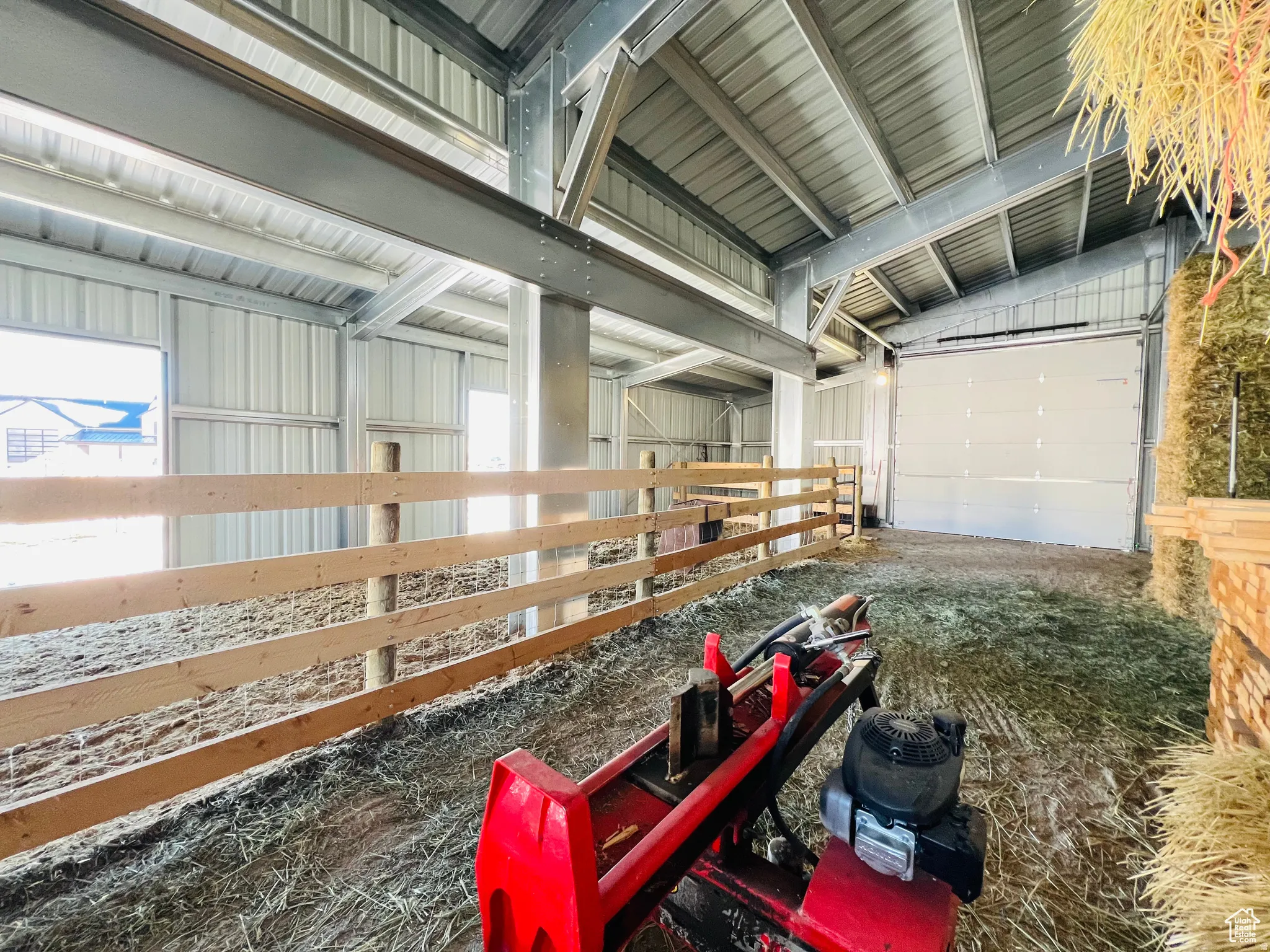 Garage featuring metal wall