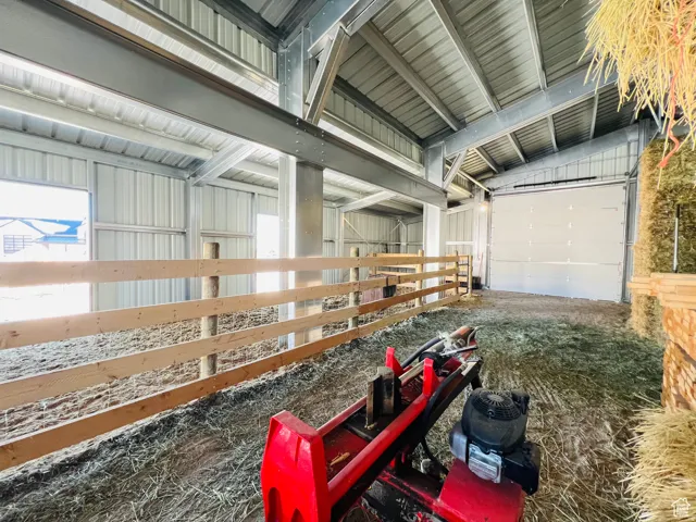 Garage featuring metal wall