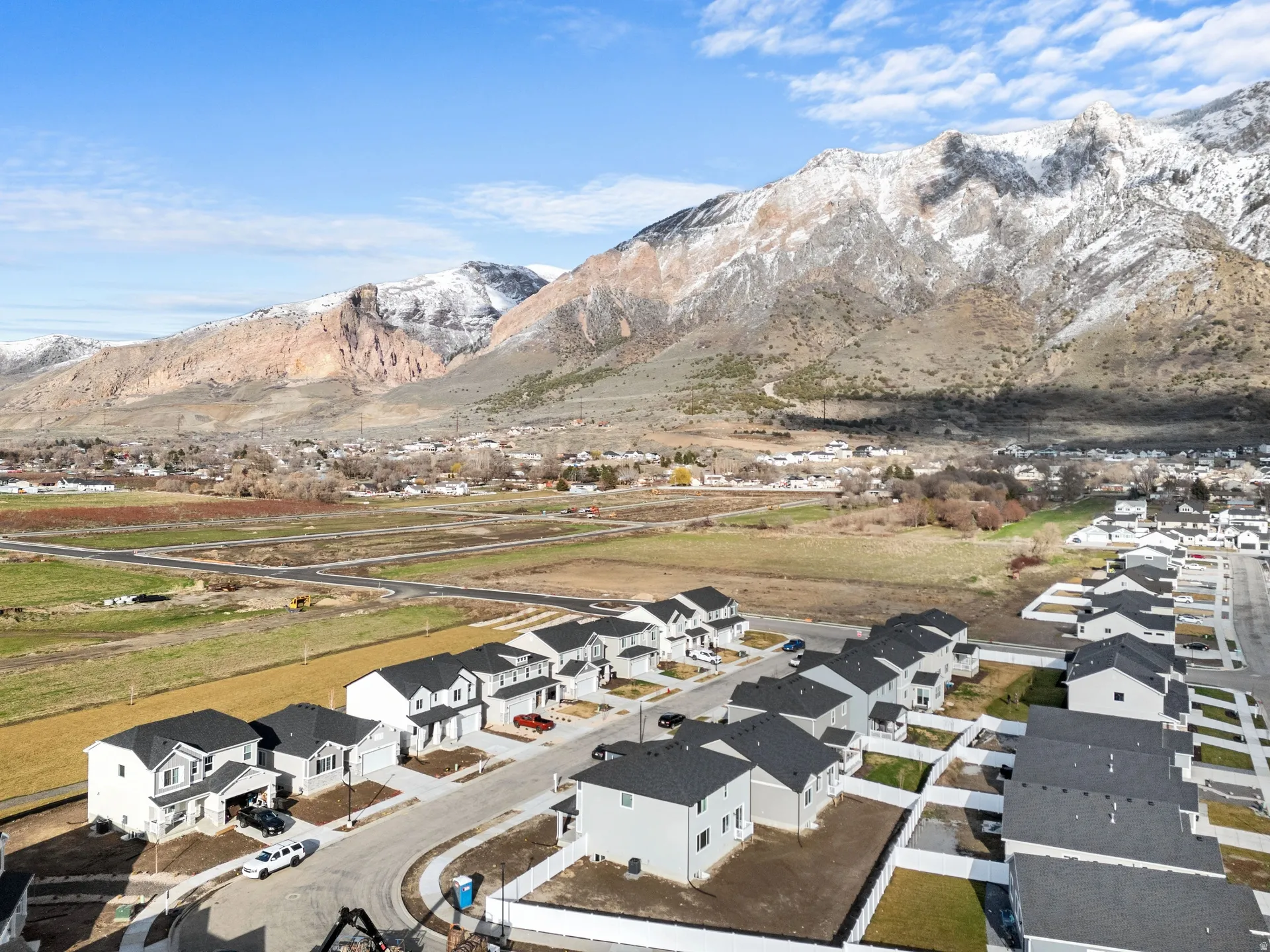 Aerial view of residential area with a mountain backdrop